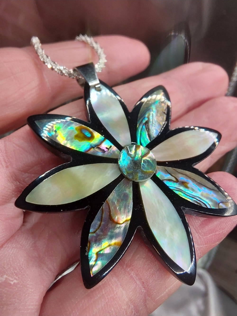 Iridescent Abalone Flower Pendant Necklace With A Gorhous Black Frame